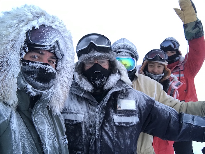 Figure 2. A frosty team of researchers following a long day of winter fieldwork on the North Slope of Alaska. Photo courtesy of Benjamin M. Jones.