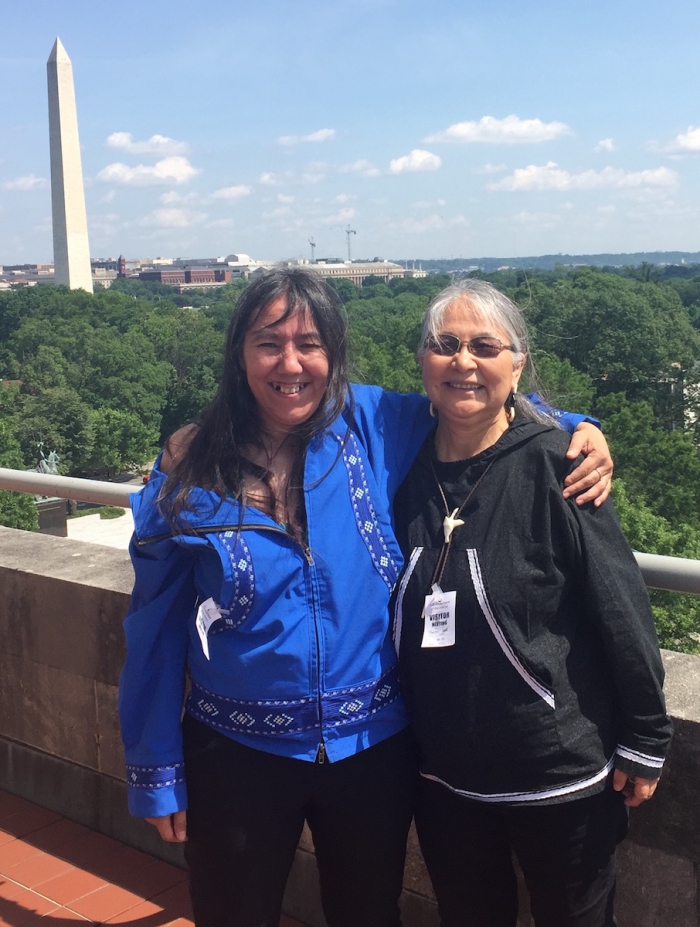 Scholarsm Rosemary Ahtuanguarak (left) and Theresa Arevgaq John (right) at Secretary of Interior&#39;s private balcony. Photo courtesy of Robert Rich.