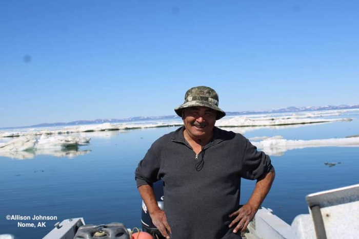 Kevin Piscoya showing us sea ice and weather conditions in Nome.